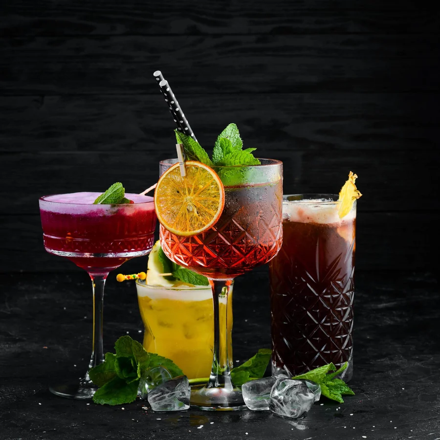 Eclipse cocktail with blue curacao, pineapple, cranberry, and grenadine